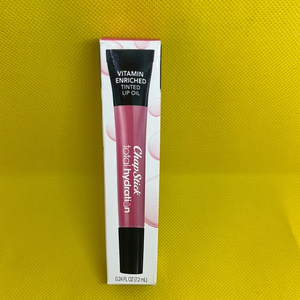 Pink Glossy Lip Oil Sleek Design